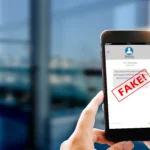 Hands holding an iphone on the Messages app, a text message is blurred out with an icon reading FAKE superimposed on top of the phone. Concept for Medicare broker fraud text messages.