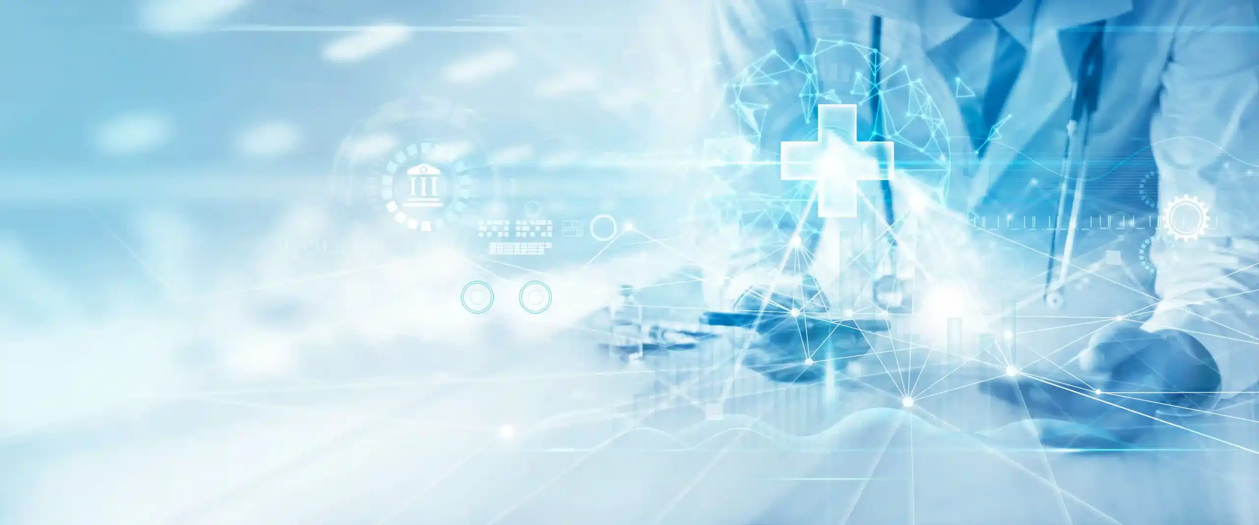 A physician holds two smart devices in his hand. Concept for using healthcare technology for pre-authorization in Medicare in 2026